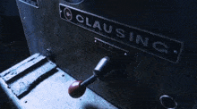 a close up of a chuck on a machine in a dark room