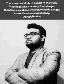 a black and white photo of a man with a quote by abhijit naskar
