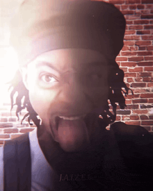 a man sticking his tongue out in front of a brick wall with the word jaizen on the bottom