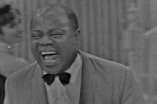 Laughing Louis Armstrong GIF