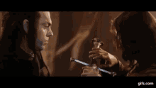 Aragorn Sword GIF - Aragorn Sword Elrond GIFs