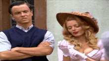 a man and a woman standing next to each other