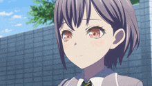 a close up of a girl 's face with red eyes