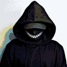 a person wearing a black hoodie and a hat with a smiley face on their face