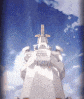 a large white object with a cross on top of it