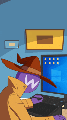 a cartoon character wearing a wizard hat is sitting in front of a computer screen
