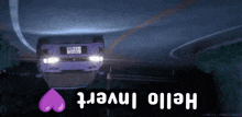 a purple car is upside down on a road and the words hello invert are below it
