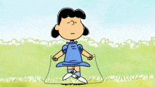 a cartoon drawing of lucy and snoopy jumping rope