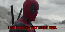 deadpool is soaking wet right now while holding two swords