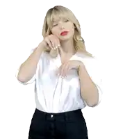 a blonde woman wearing a white shirt and black shorts is dancing