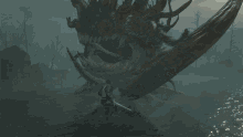 a large monster is surrounded by flames and trees