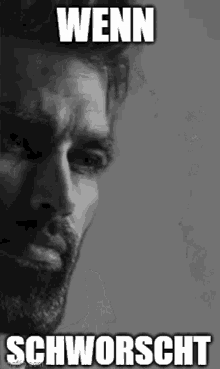 a black and white photo of a man with a beard and the words `` wenn schworscht '' written on it .