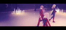 three anime girls are dancing together in a dark room .