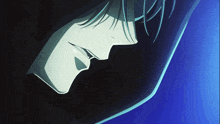 a close up of a person 's face in the dark