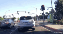car crash accident traffic light post ran over viral videos