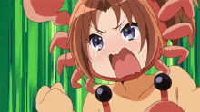 a girl in a crab costume is making a face