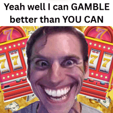 a man is smiling in front of a slot machine that has the number 77 on it