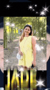 a woman in a yellow dress is surrounded by sparkles and the word jade