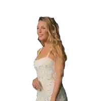 a woman in a white dress stands with her hands on her hips and her eyes closed