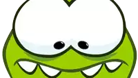 a green cartoon character with big eyes and sharp teeth looks angry