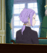 a woman with purple hair is sitting in a chair