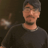 a man wearing glasses is surrounded by glowing lines and the number 5