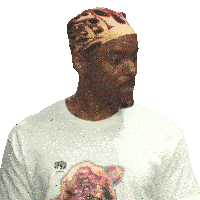 a man wearing a headband and a t-shirt with the word cpaw on it