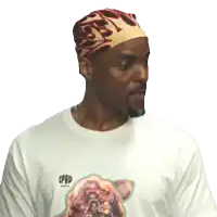 a man wearing a headband and a t-shirt with the word cpaw on it