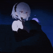 a girl in a black dress is standing in the dark