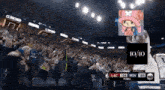 a crowd of people watching a basketball game with a 10/10 score