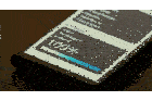 a cell phone displays a percentage of 100 percent