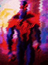 a blurred image of a person in a red and purple background