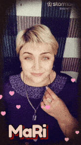 a woman wearing a necklace and a ring has the name mari on her face