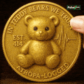 a gold coin that says in teddy bears we trust