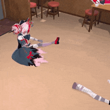 a girl in a dress is sitting on the floor with a bandaged leg
