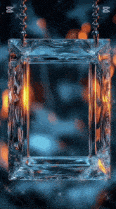 a square glass frame hanging from a chain with a blue background