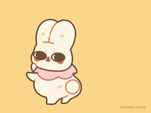 a drawing of a bunny with a pink scarf and the words moenie.coco below it