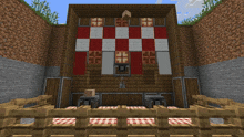 a wooden building with a red and white checkered pattern