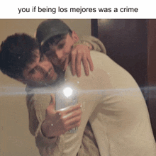 a picture of two men hugging with the caption you if being los mejores was a crime