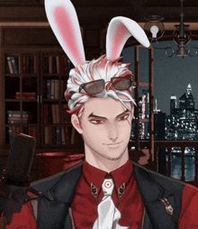 a man wearing bunny ears and sunglasses stands in front of a bookshelf