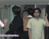 a group of people standing in a room with the words bbc collab night out on the bottom right