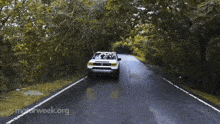 a car is driving down a road with motorweek.org on the bottom