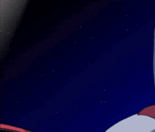 a close up of sonic the hedgehog 's face against a dark background
