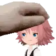 a hand is putting a towel on a girl 's head .