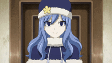 a girl with blue hair and a white hat with a yellow flower on it
