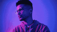 a man with glasses and the name jordan fisher on it