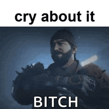 a man with a beard is holding a gun with the words cry about it bitch below him