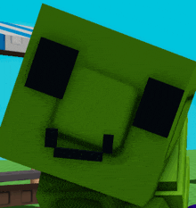 a green block with black squares on it