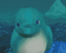 a pixel art of a penguin swimming in the ocean .