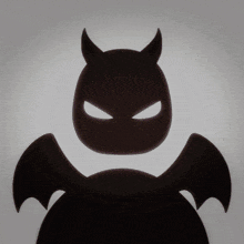 a silhouette of a devil with wings and horns